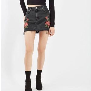 Denim mini skirt with floral decals